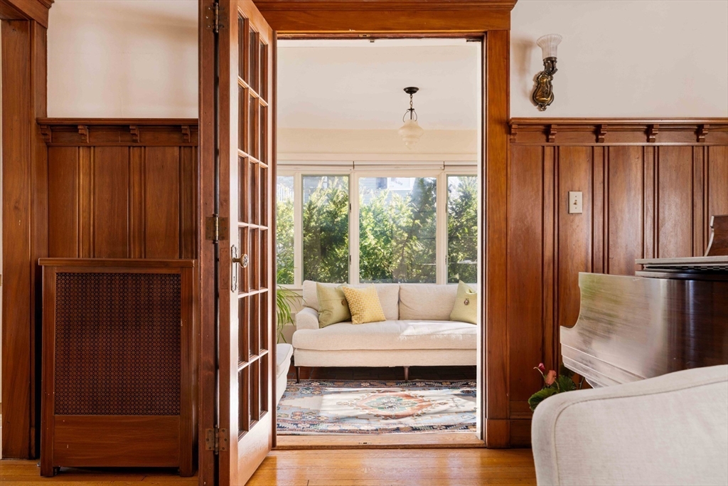 289 Clinton Road Brookline, MA 02445 - Photo 11 of 24 a living room with furniture and a window