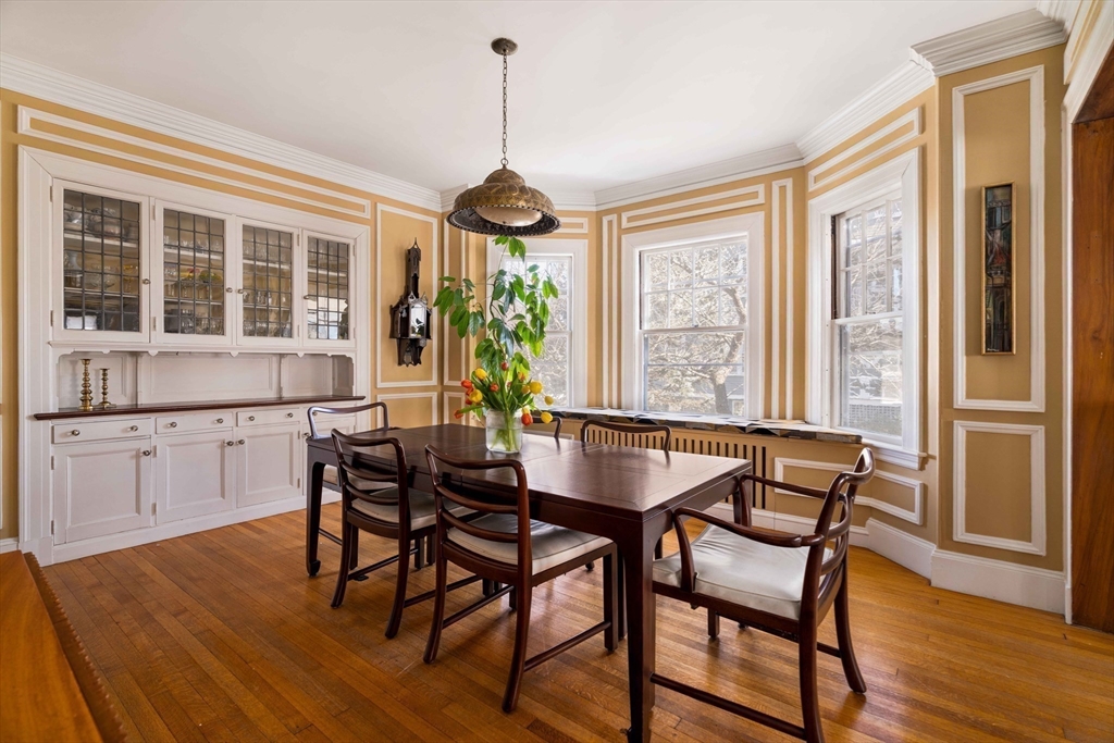 289 Clinton Road Brookline, MA 02445 - Photo 5 of 24 a dining room with furniture window wooden floor