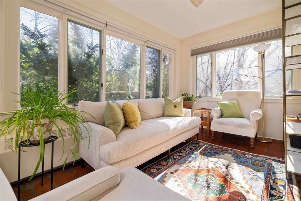 289 Clinton Road Brookline, MA 02445 - Photo 7 of 24 a living room with furniture and a large window