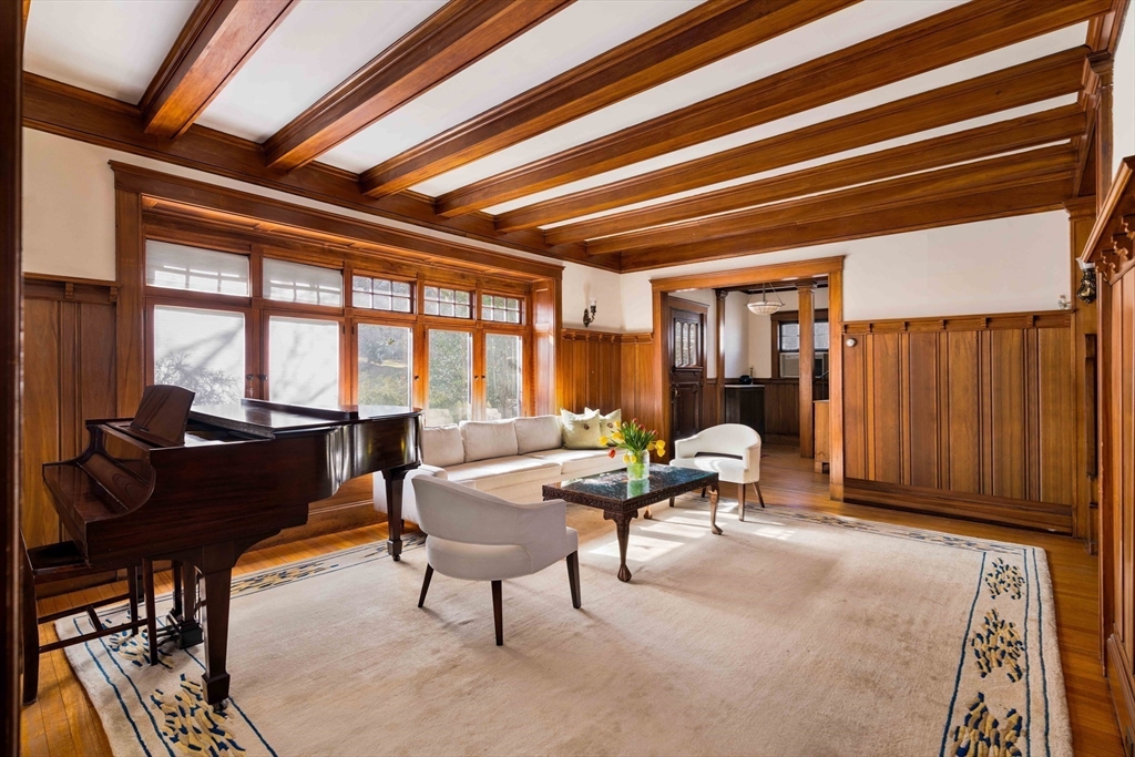 289 Clinton Road Brookline, MA 02445 - Photo 10 of 24 a living room with furniture and a window