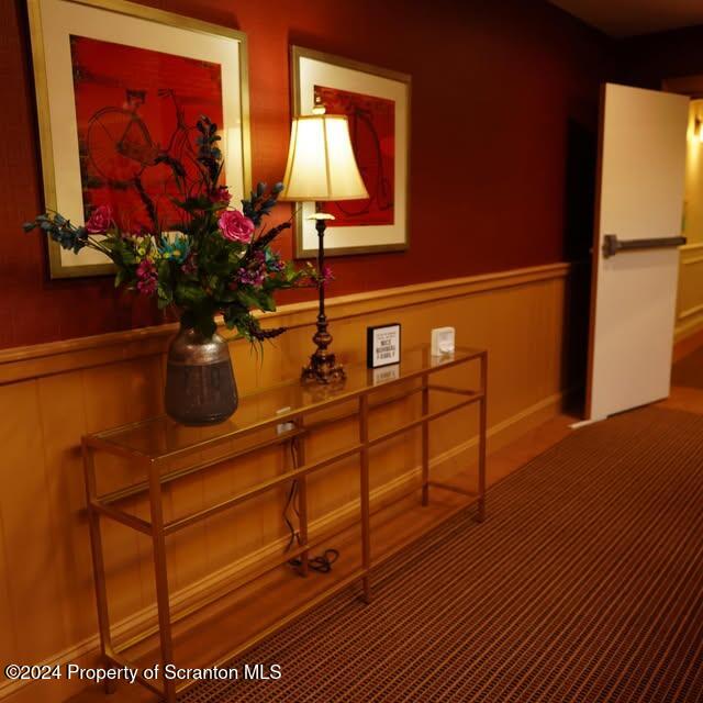 201 Resort Lane Tunkhannock, PA 18657 - Photo 17 of 32 a view of a living room with a piano and wooden floor