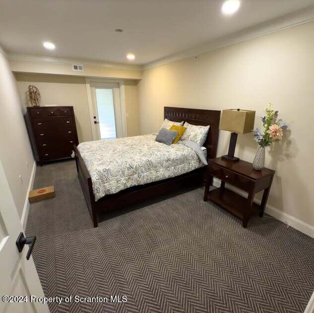 201 Resort Lane Tunkhannock, PA 18657 - Photo 20 of 32 a spacious bedroom with a bed and dresser