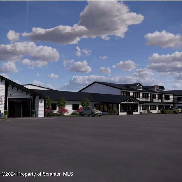 201 Resort Lane Tunkhannock, PA 18657 - Photo 2 of 32 a couple of cars parked in front of building