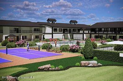 201 Resort Lane Tunkhannock, PA 18657 - Photo 22 of 32 a front view of a house with a yard table and chairs