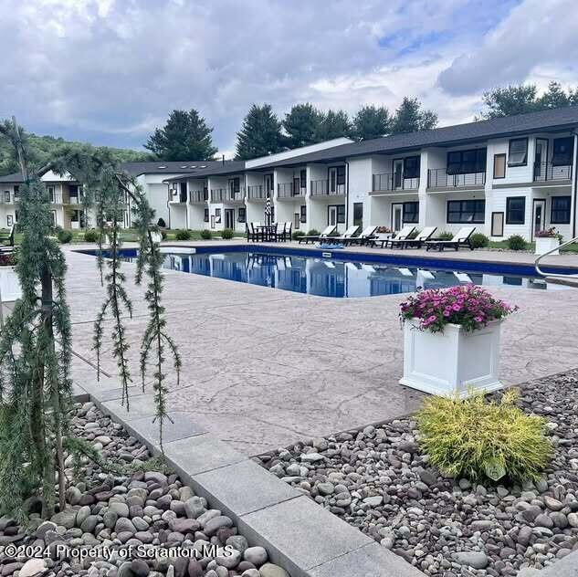 201 Resort Lane Tunkhannock, PA 18657 - Photo 23 of 32 a view of a house with a patio