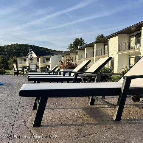 a front view of a house with garage