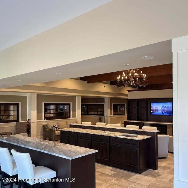 201 Resort Lane Tunkhannock, PA 18657 - Photo 4 of 32 a large kitchen with a table and chairs in it