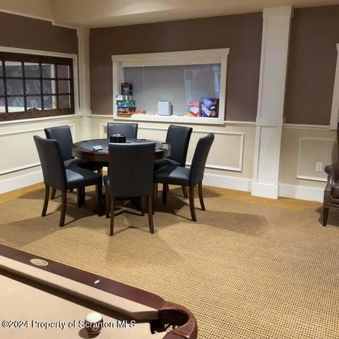 a view of a dining room with furniture