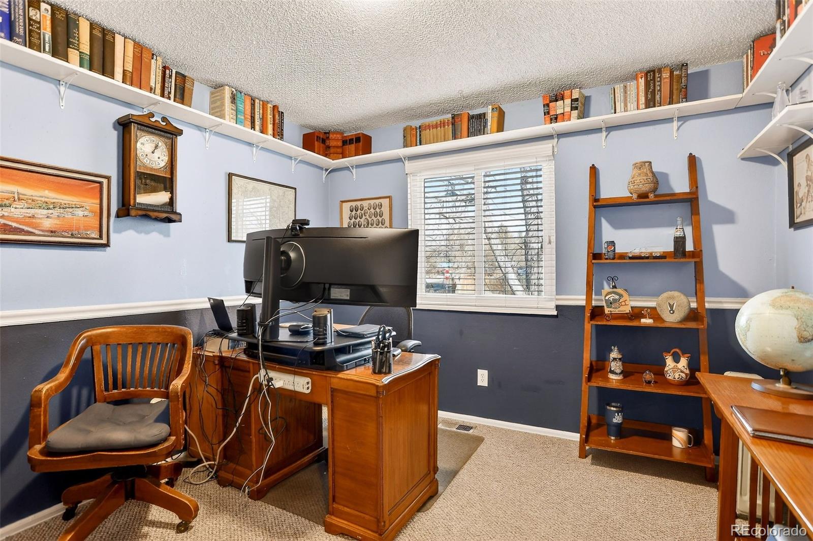 1503 South Mobile Street Aurora, CO 80017 - Photo 12 of 19 a livingroom with workspace and a window
