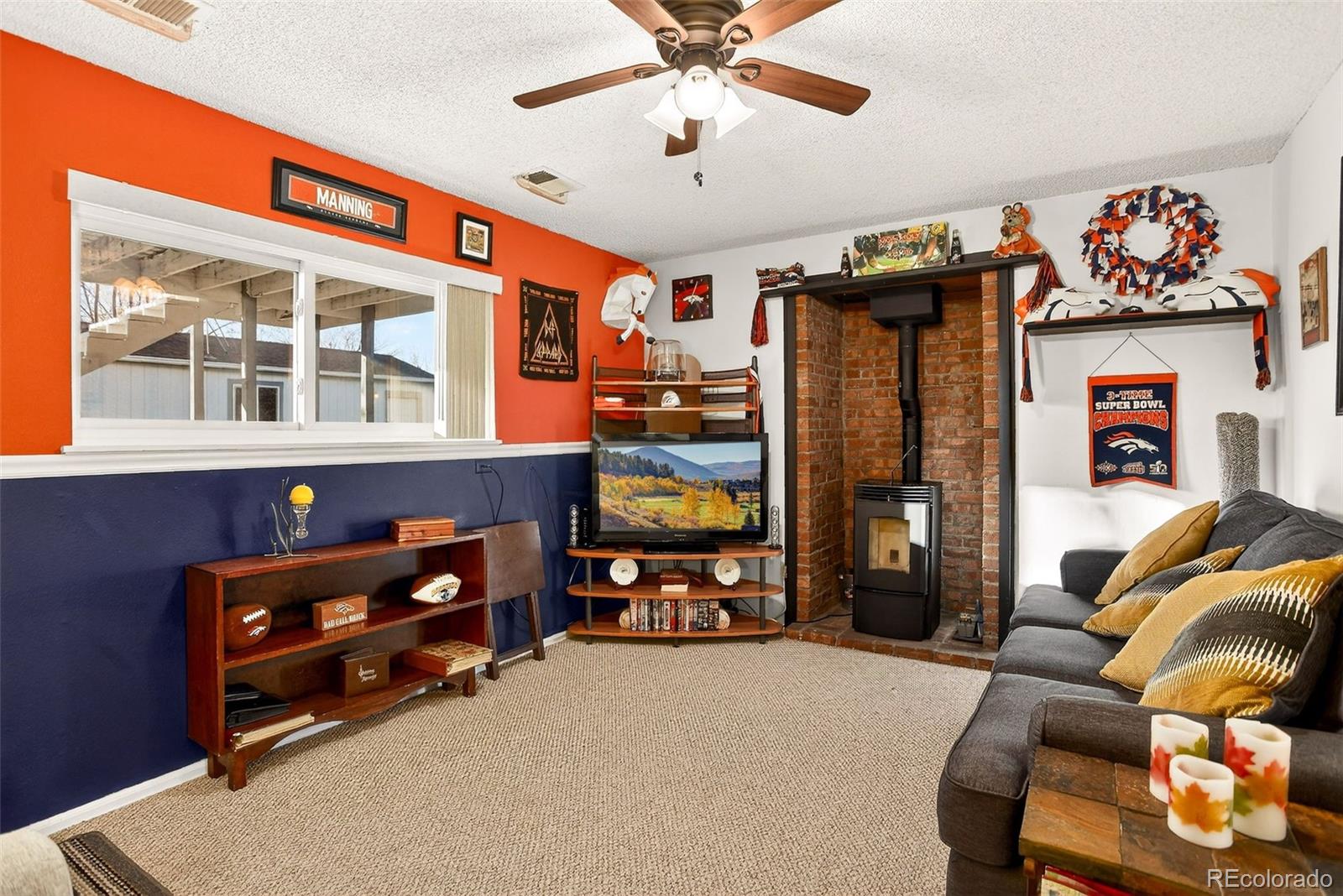 1503 South Mobile Street Aurora, CO 80017 - Photo 13 of 19 a bedroom with furniture and a flat screen tv