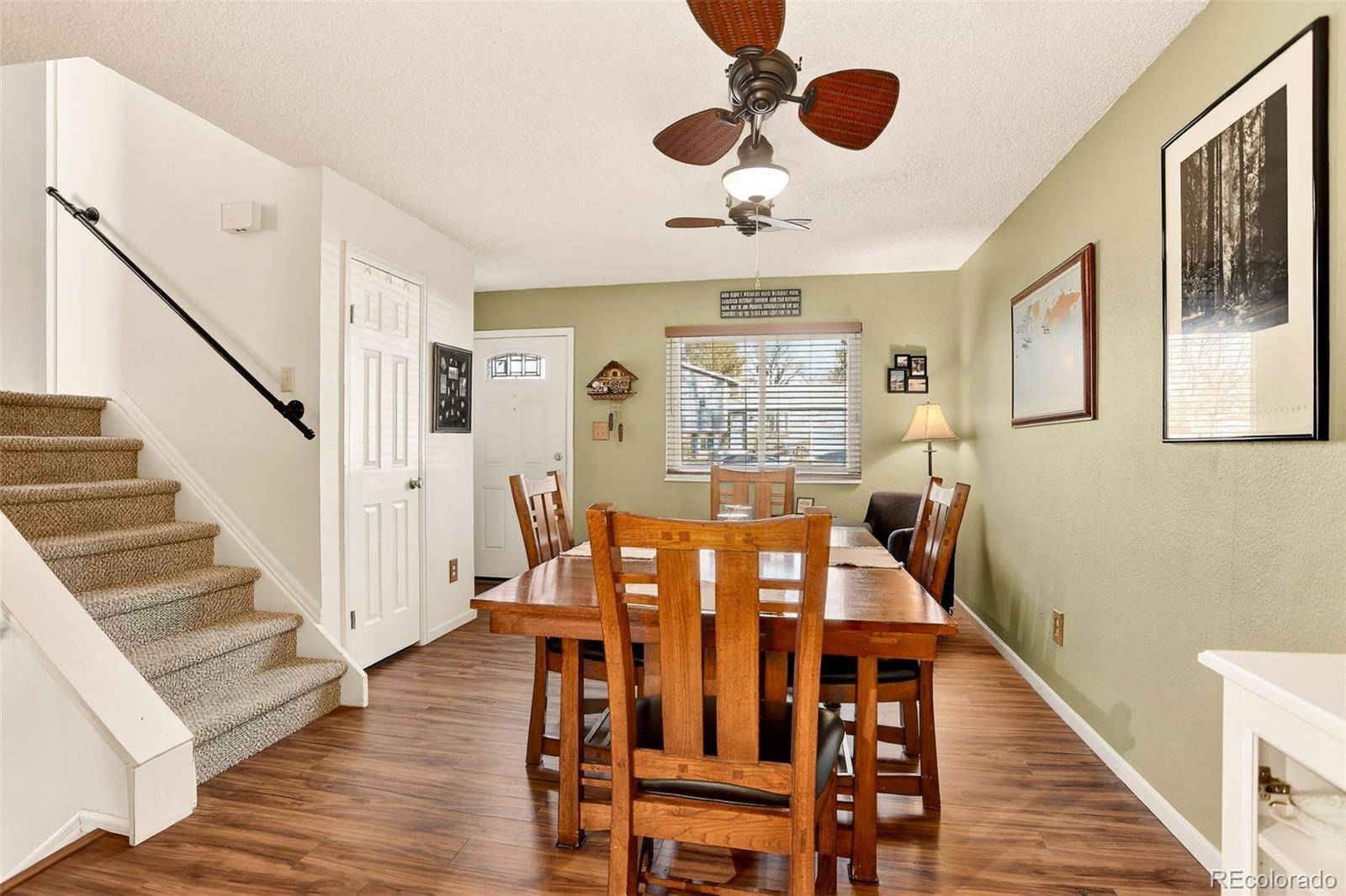 1503 South Mobile Street Aurora, CO 80017 - Photo 15 of 19 a view of a dining room with furniture and wooden floor