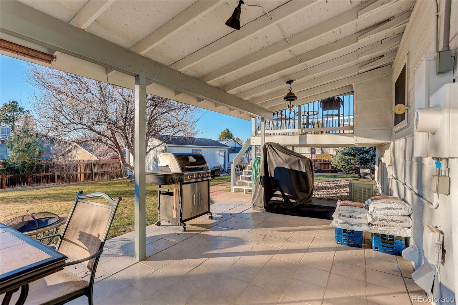 1503 South Mobile Street Aurora, CO 80017 - Photo 5 of 19 a view of livingroom with furniture and flat screen tv