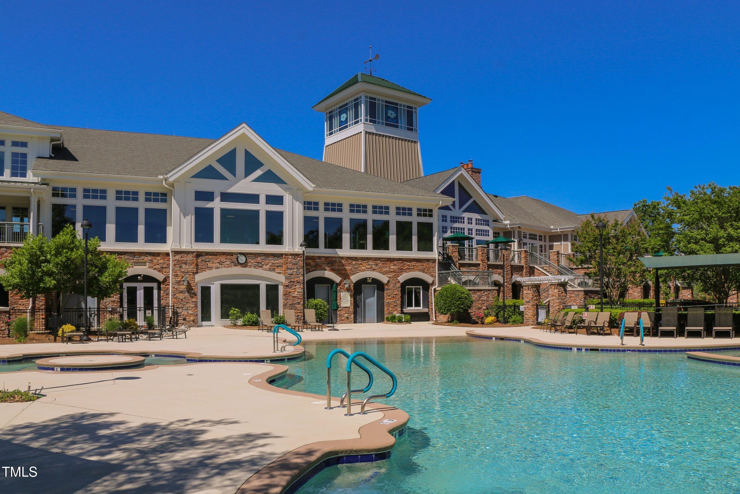 821 Blackfriars Loop Cary, NC 27519 - Photo 2 of 29 a front view of a house with swimming pool