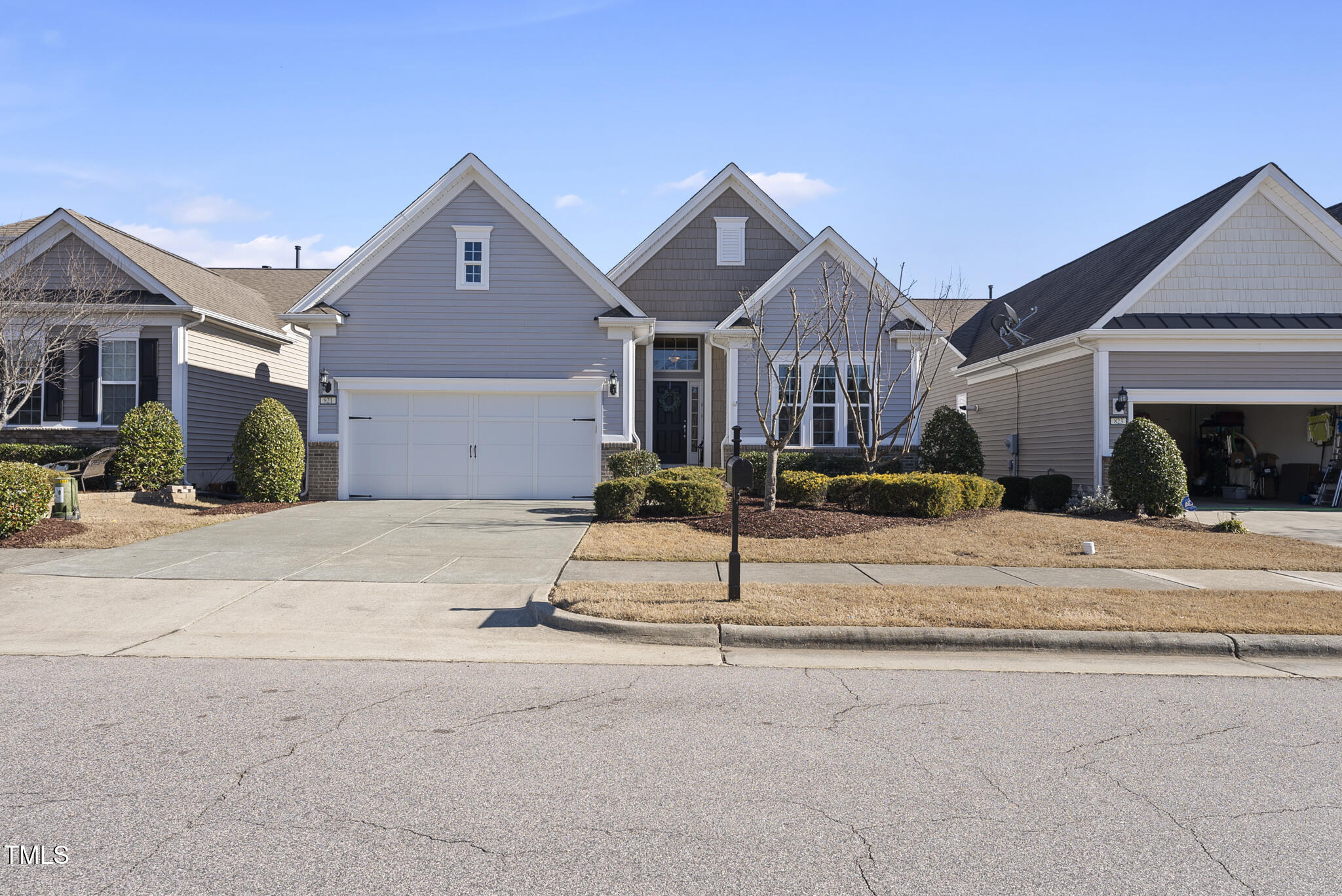 821 Blackfriars Loop Cary, NC 27519 - Photo 3 of 29 a house view with a street