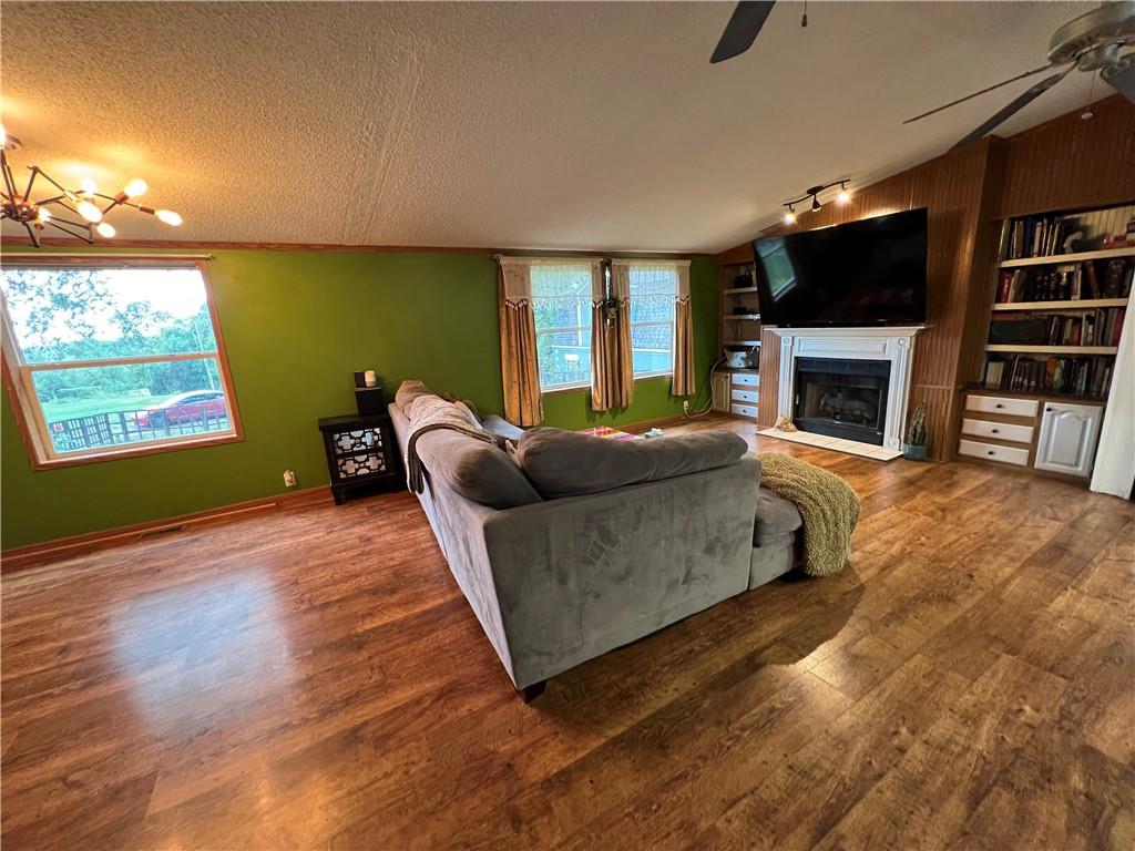 147 Russell Hill Road Industry, PA 15052 - Photo 13 of 50 Great entertainment space in the living room with a propane fireplace