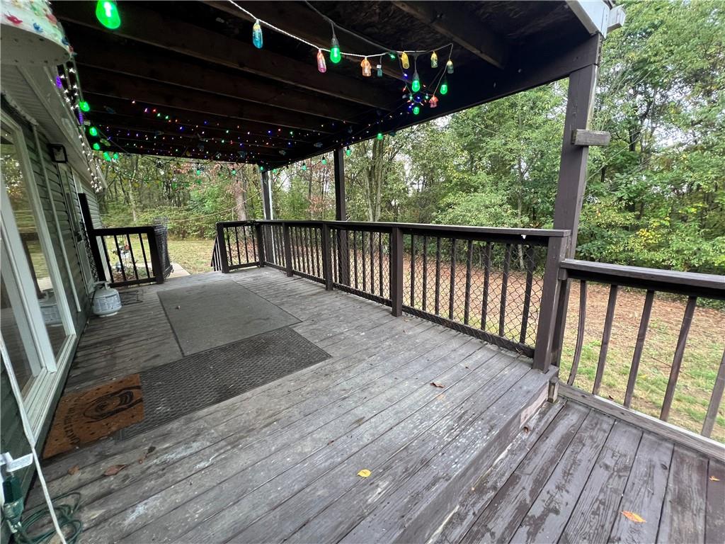 147 Russell Hill Road Industry, PA 15052 - Photo 36 of 50 Awesome covered porch to relax and enjoy the privacy