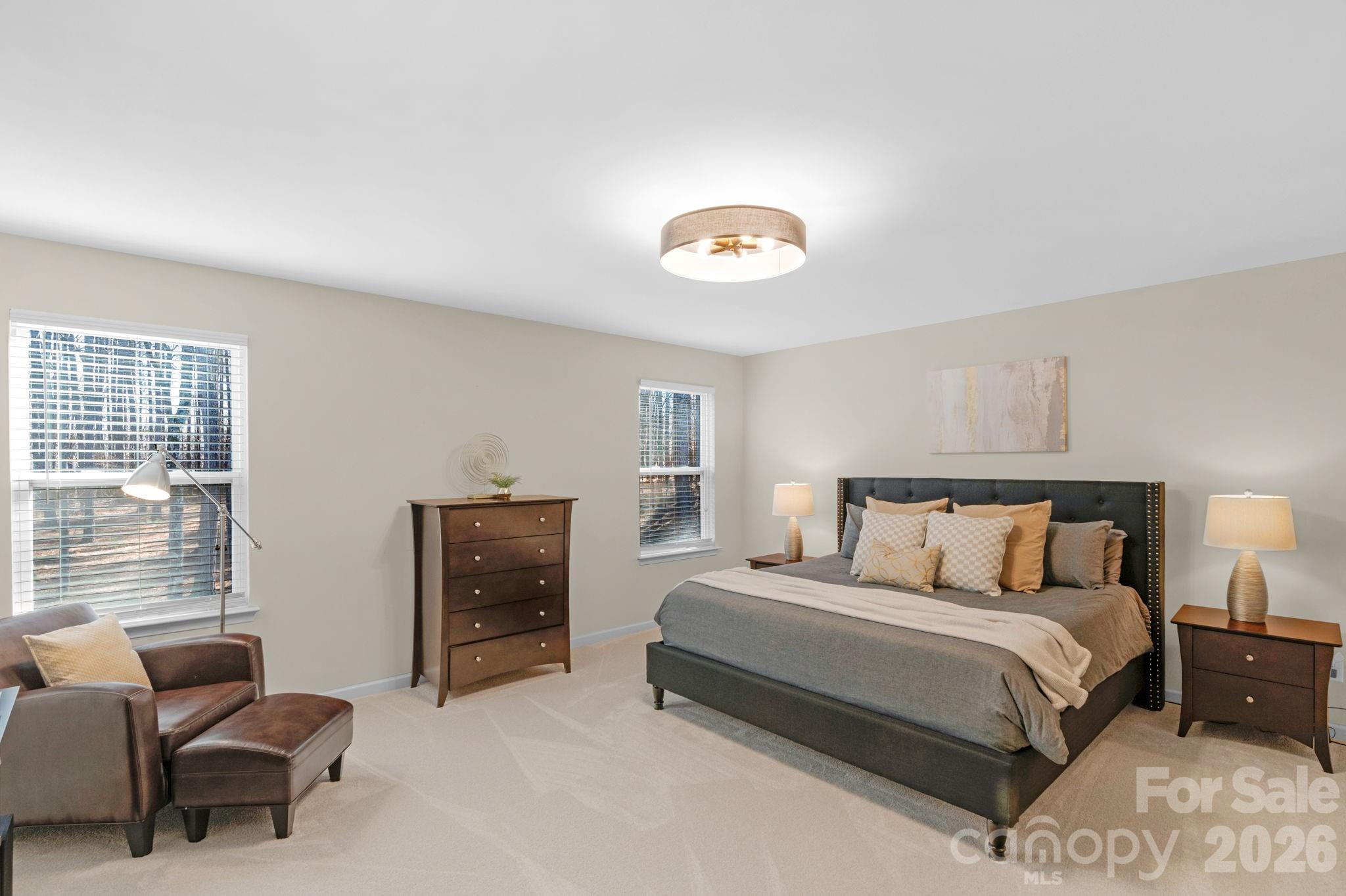 1508 Springfield Drive Waxhaw, NC 28173 - Photo 31 of 48 a bedroom with a bed and furniture