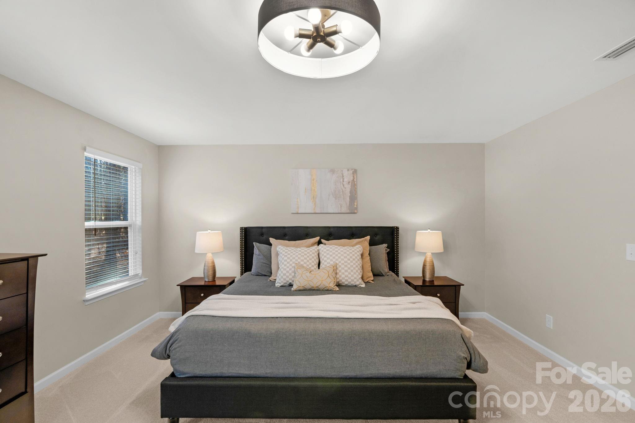 1508 Springfield Drive Waxhaw, NC 28173 - Photo 32 of 48 a bedroom with a bed and a window