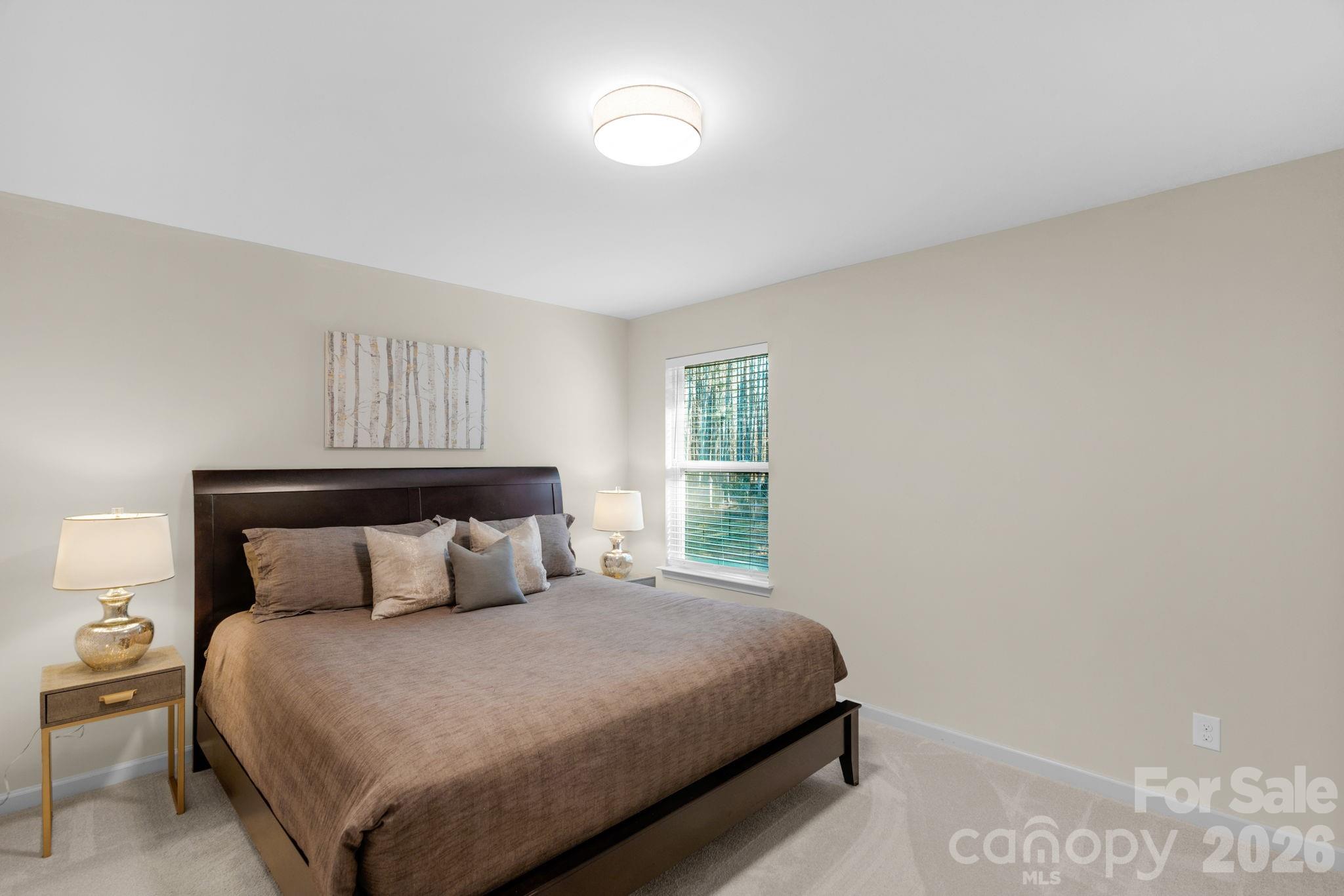 1508 Springfield Drive Waxhaw, NC 28173 - Photo 37 of 48 a bedroom with a bed and window