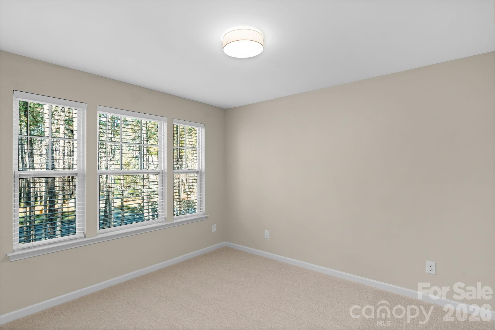 1508 Springfield Drive Waxhaw, NC 28173 - Photo 39 of 48 a view of an empty room with a window