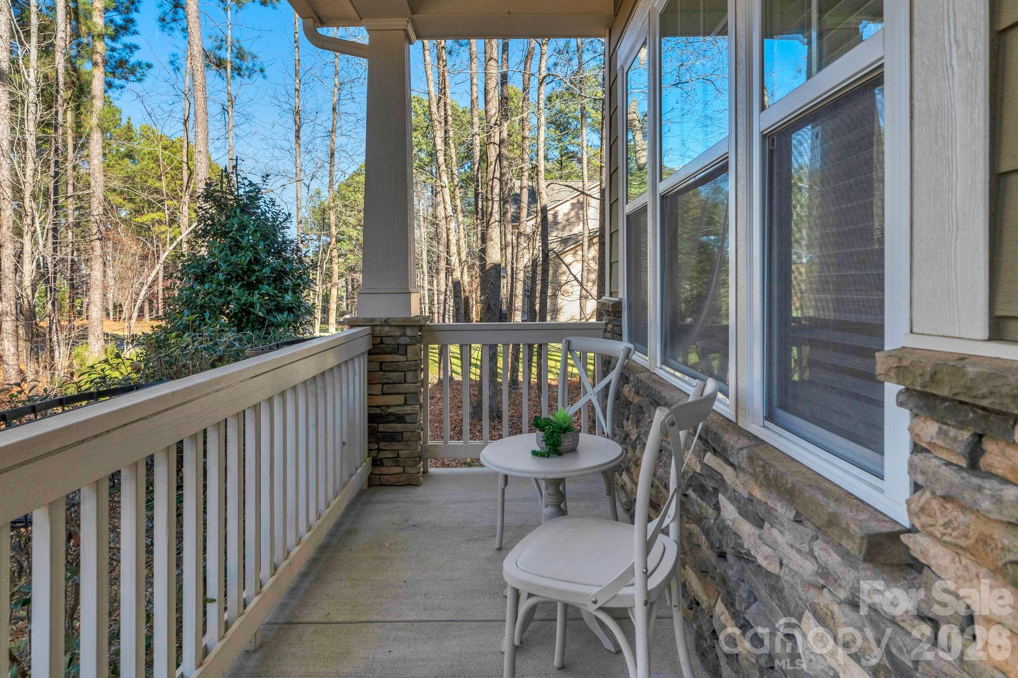 1508 Springfield Drive Waxhaw, NC 28173 - Photo 4 of 48 a view of a chair and table in the balcony