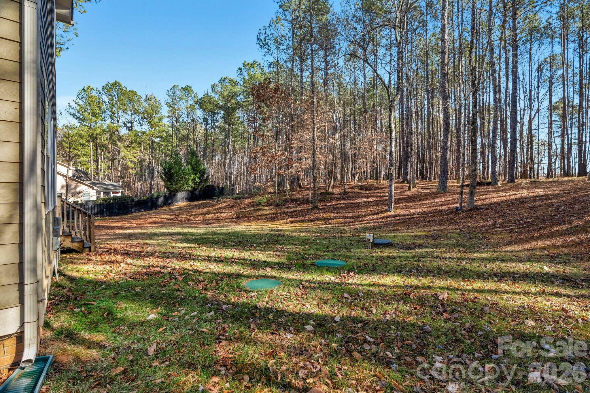 1508 Springfield Drive Waxhaw, NC 28173 - Photo 42 of 48 a view of a house with a yard and sitting area
