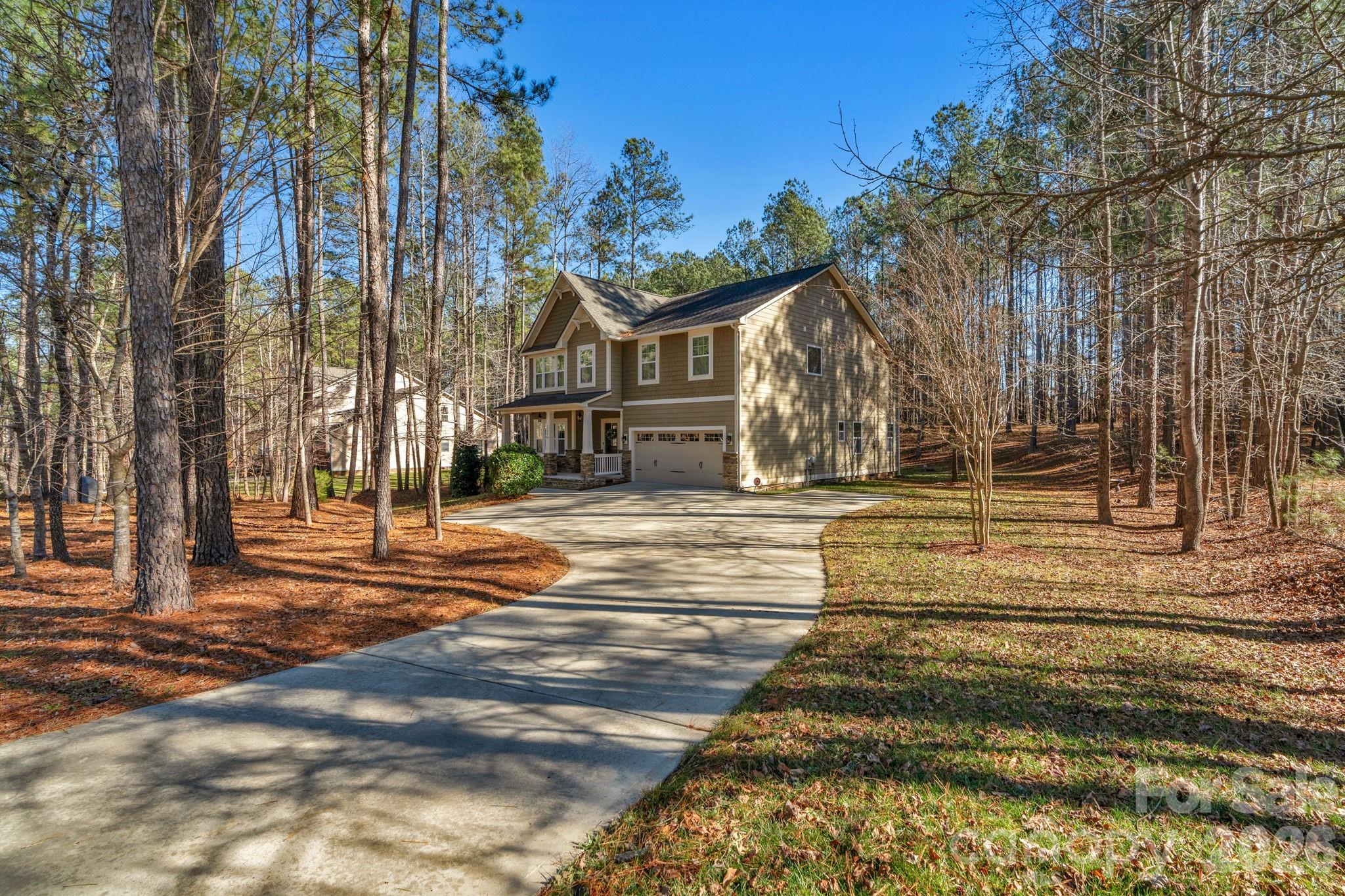 1508 Springfield Drive Waxhaw, NC 28173 - Photo 43 of 48 a front view of a house with a yard