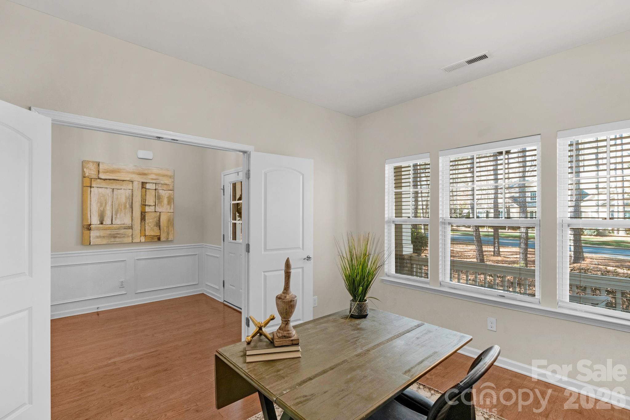 1508 Springfield Drive Waxhaw, NC 28173 - Photo 8 of 48 a living room with furniture and wooden floor