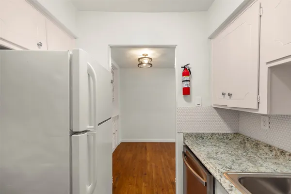 a view of kitchen and utility room