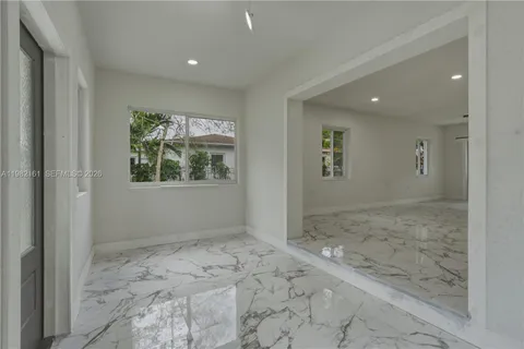 a view of hallway with window