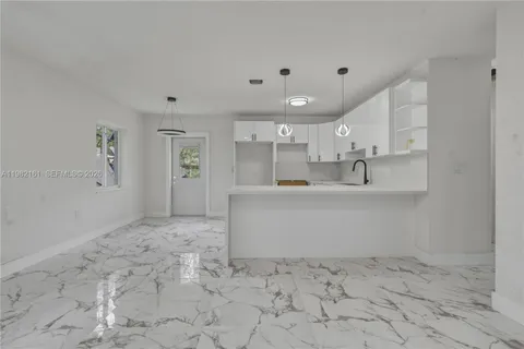 a view of kitchen and center island