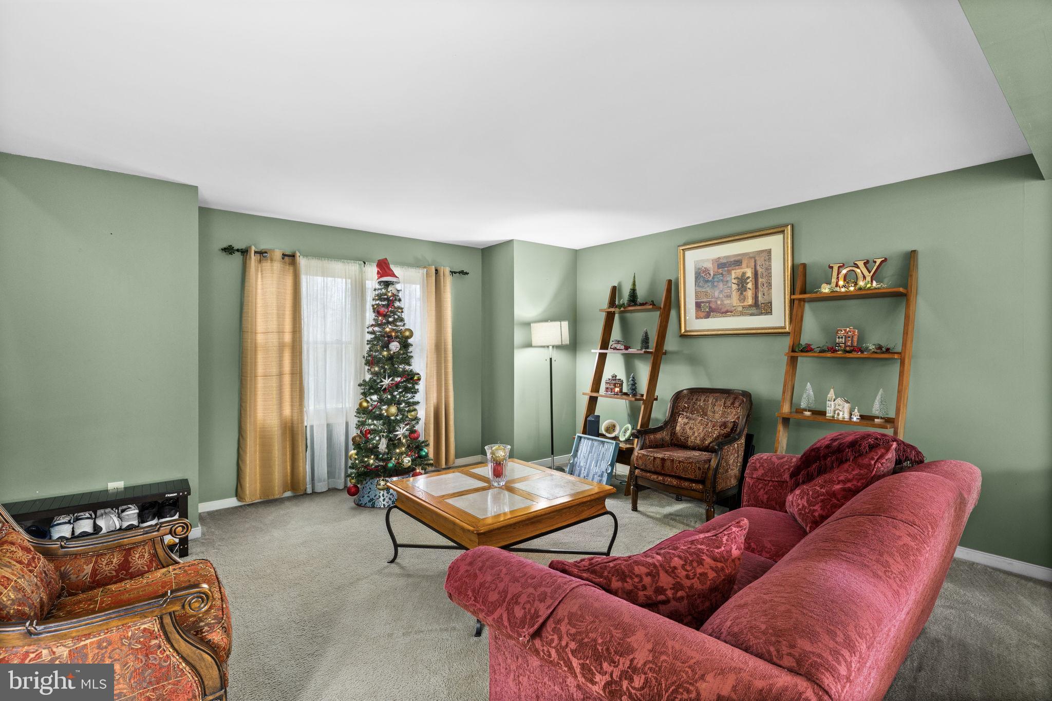 227 Cedar Ridge Drive Ruther Glen, VA 22546 - Photo 7 of 44 a bedroom with furniture and a window