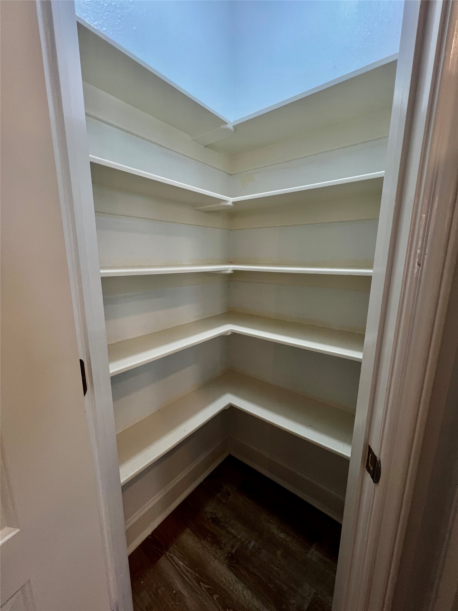 312 Mission Lane Houston, TX 77011 - Photo 12 of 19 a storage room with wooden floor