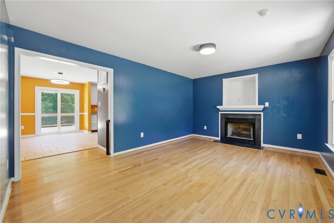 2512 Brookforest Road Midlothian, VA 23112 - Photo 8 of 40 Spacious room featuring light wood-finish flooring