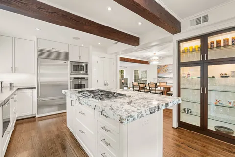 a view of a street with a park