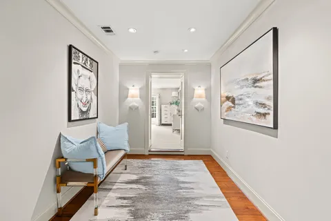 a view of backyard with swimming pool and furniture