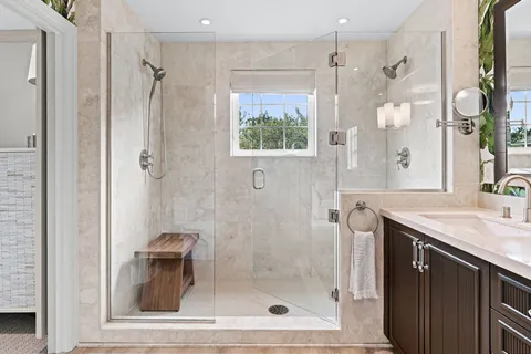a kitchen with a refrigerator and a stove