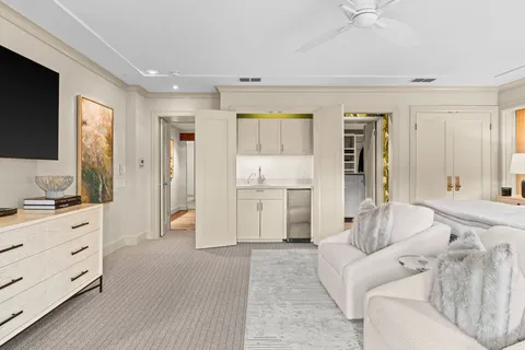 a bathroom with a bathtub and a window