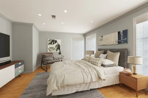 a kitchen with white cabinets and a sink