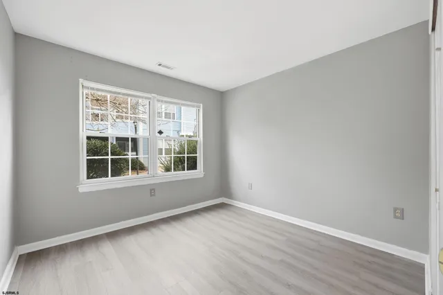 a view of a hallway with closet