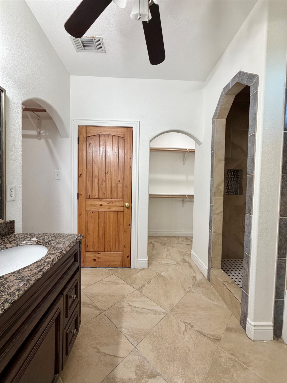 1530 Dearing Street Port Neches, TX 77651 - Photo 18 of 28 a view of a kitchen with a sink and cabinets