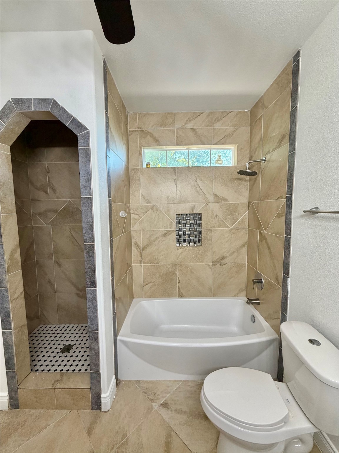 1530 Dearing Street Port Neches, TX 77651 - Photo 19 of 28 a bathroom with a toilet and a shower