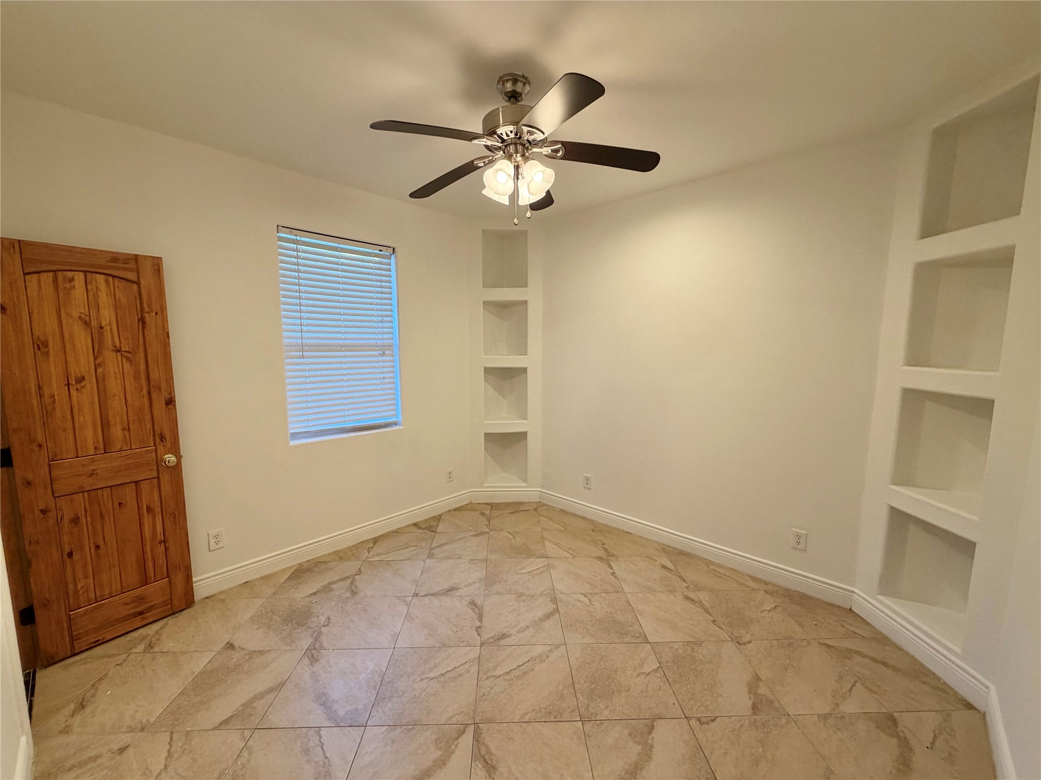 1530 Dearing Street Port Neches, TX 77651 - Photo 21 of 28 a view of an empty room with a window