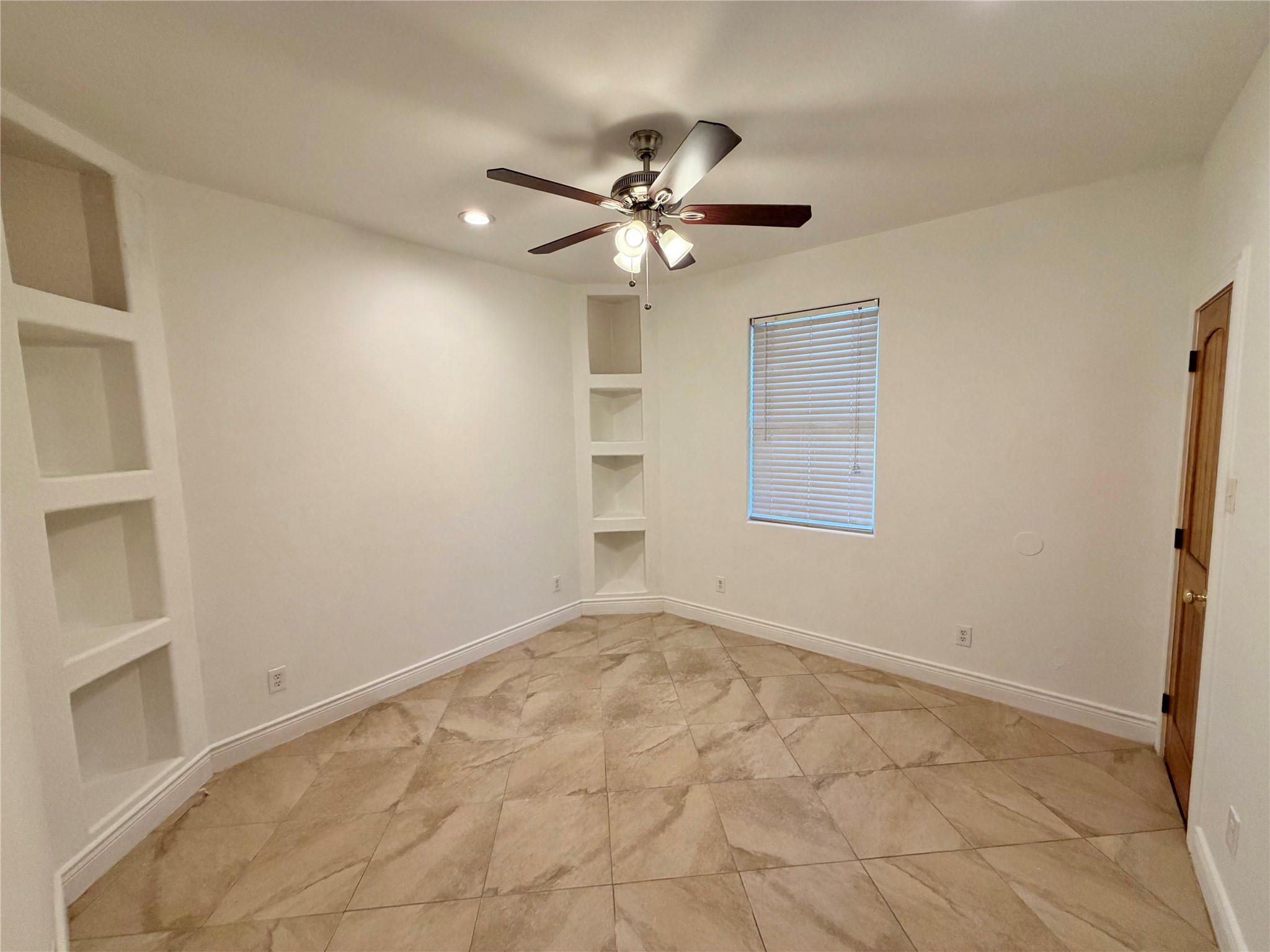 1530 Dearing Street Port Neches, TX 77651 - Photo 22 of 28 a view of an empty room with a window