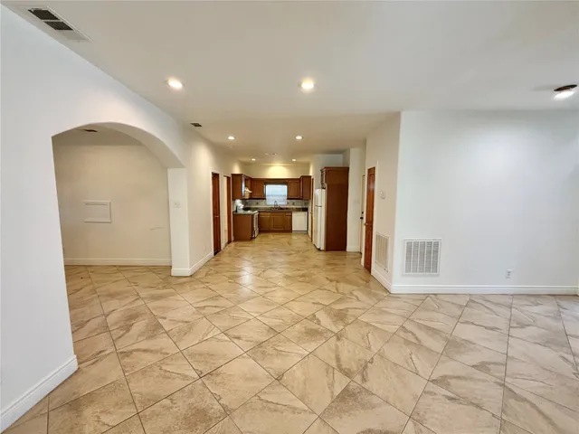 a view of a electric appliances in kitchen and a window
