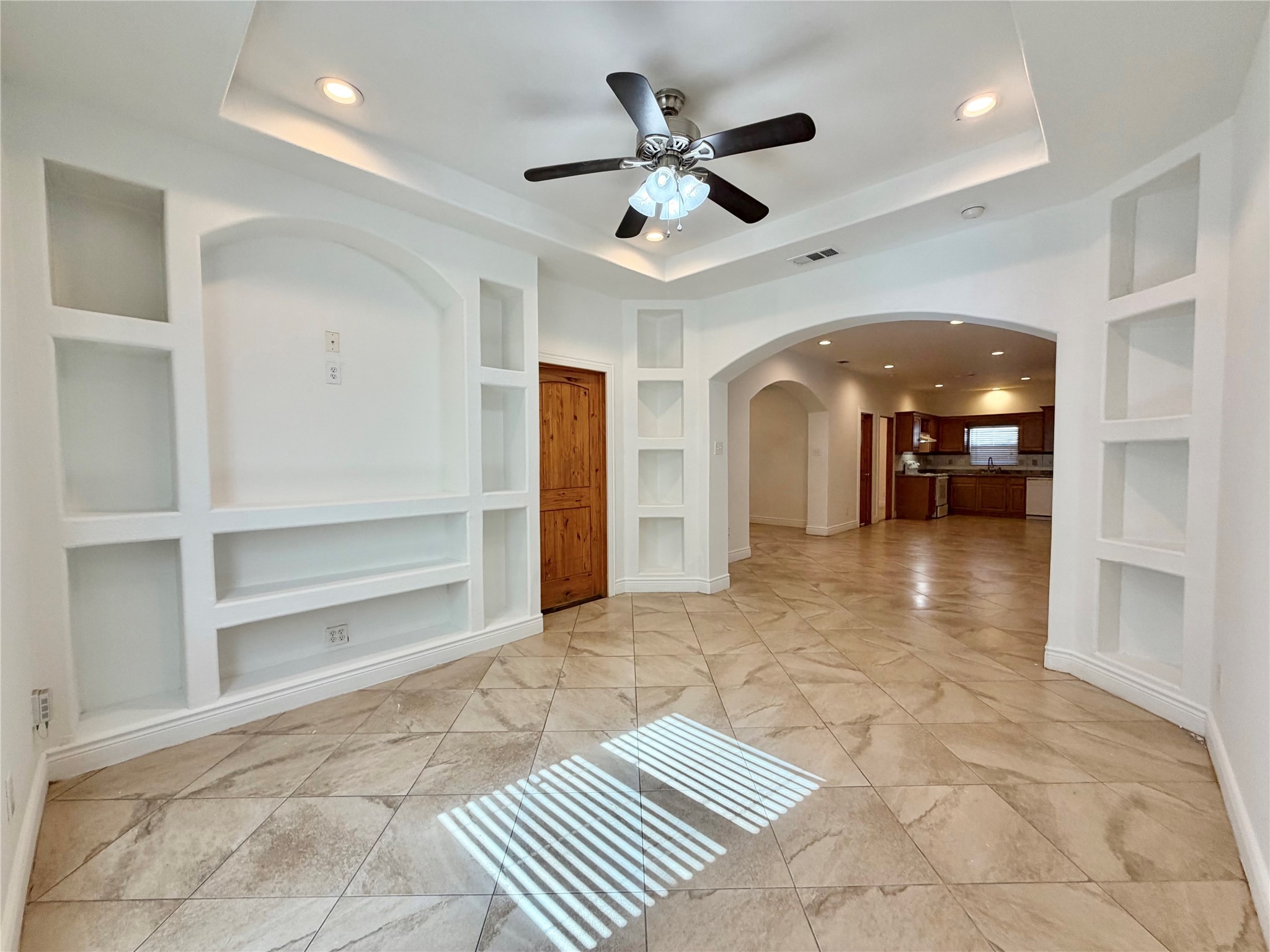 1530 Dearing Street Port Neches, TX 77651 - Photo 7 of 28 a view of livingroom with hardwood floor and a ceiling fan