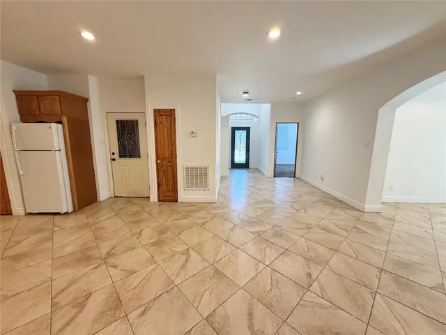 a view of a kitchen with a sink