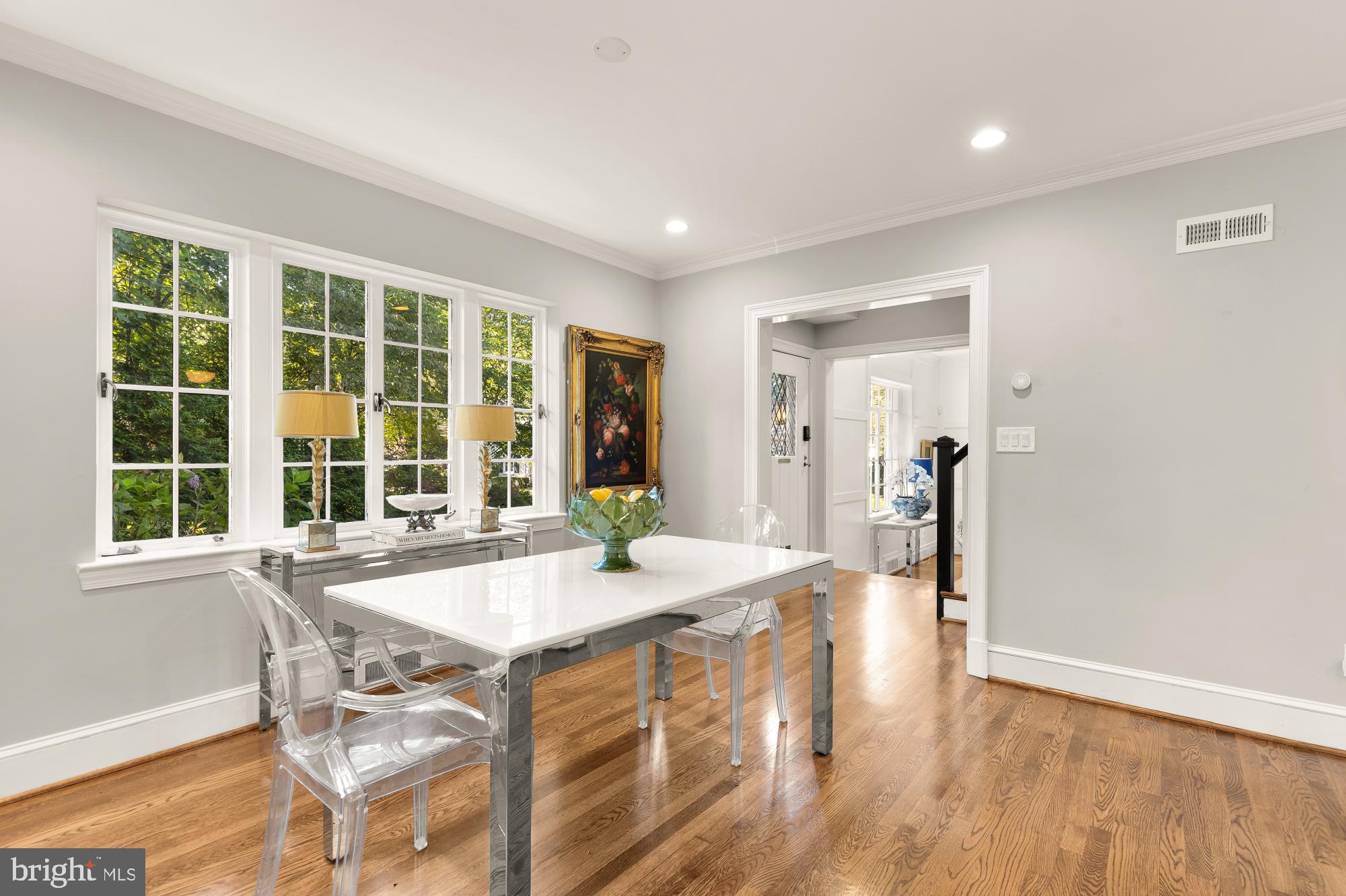 3110 Rolling Road Chevy Chase, MD 20815 - Photo 15 of 64 a view of a dining room with furniture window and outside view