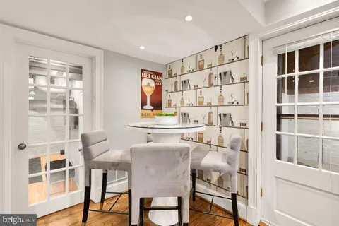 a bedroom with a bed and ceiling fan