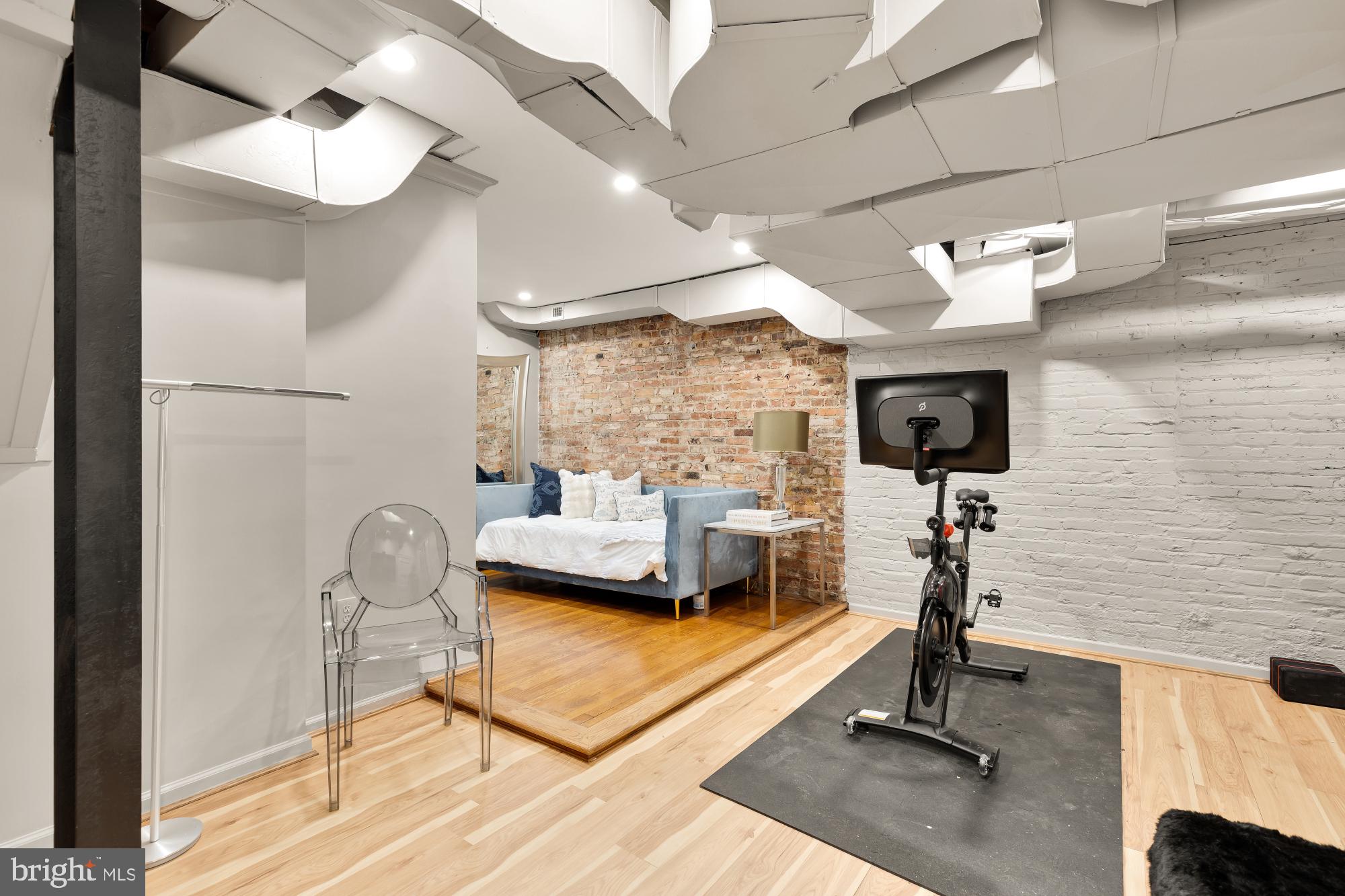 3110 Rolling Road Chevy Chase, MD 20815 - Photo 28 of 64 a view of a livingroom with furniture and a flat screen tv
